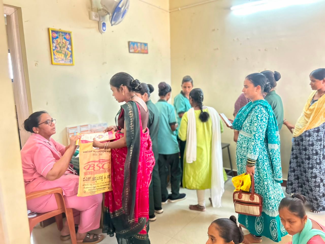 Women registering in queue
